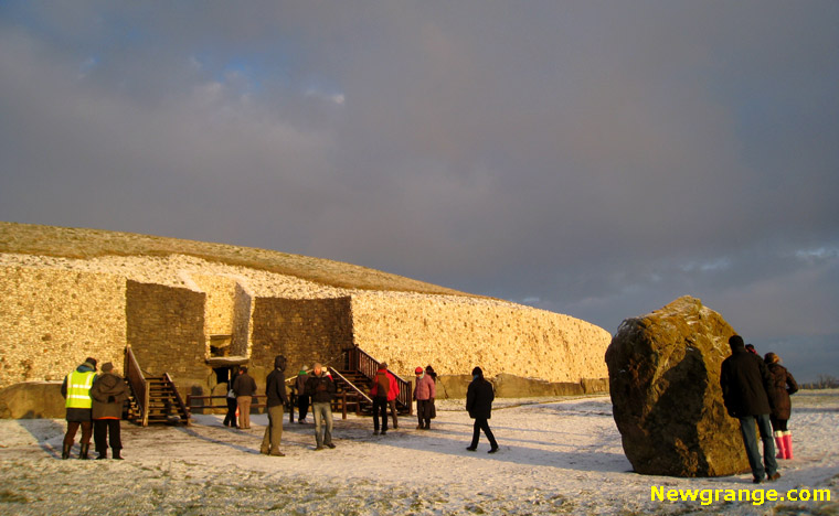 Newgrange illuminated by the rising sun