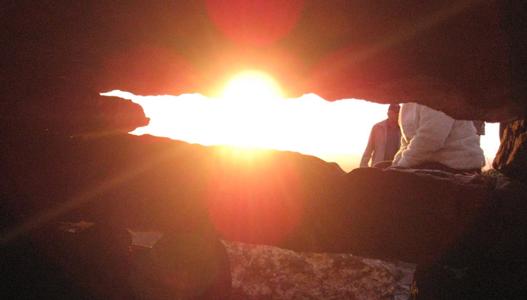 Sunset viewed through the roofbox from inside Cairn G in Carrowkeel