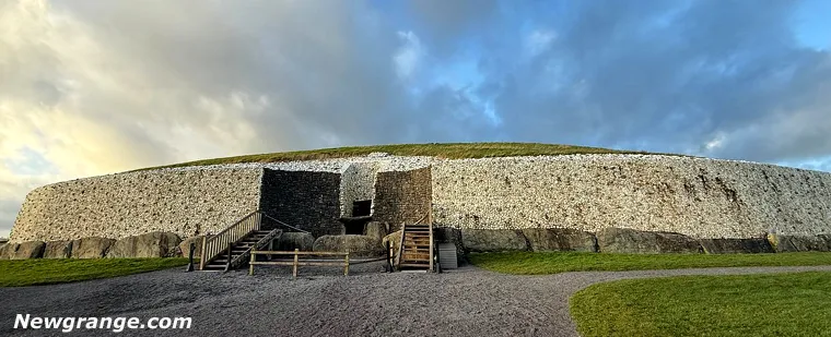 Newgrange as it stands today, after restoration work has replaced the white quartz façade and altered the entrance
